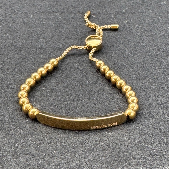 Michael Kors Jewelry - Michael Kors Gold Logo Plaque Beaded Slider Bracelet